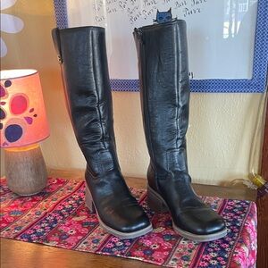 Dr. Scholl's Black knee high boots with rubber soles.